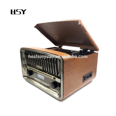 Home audio record player in wooden retro style